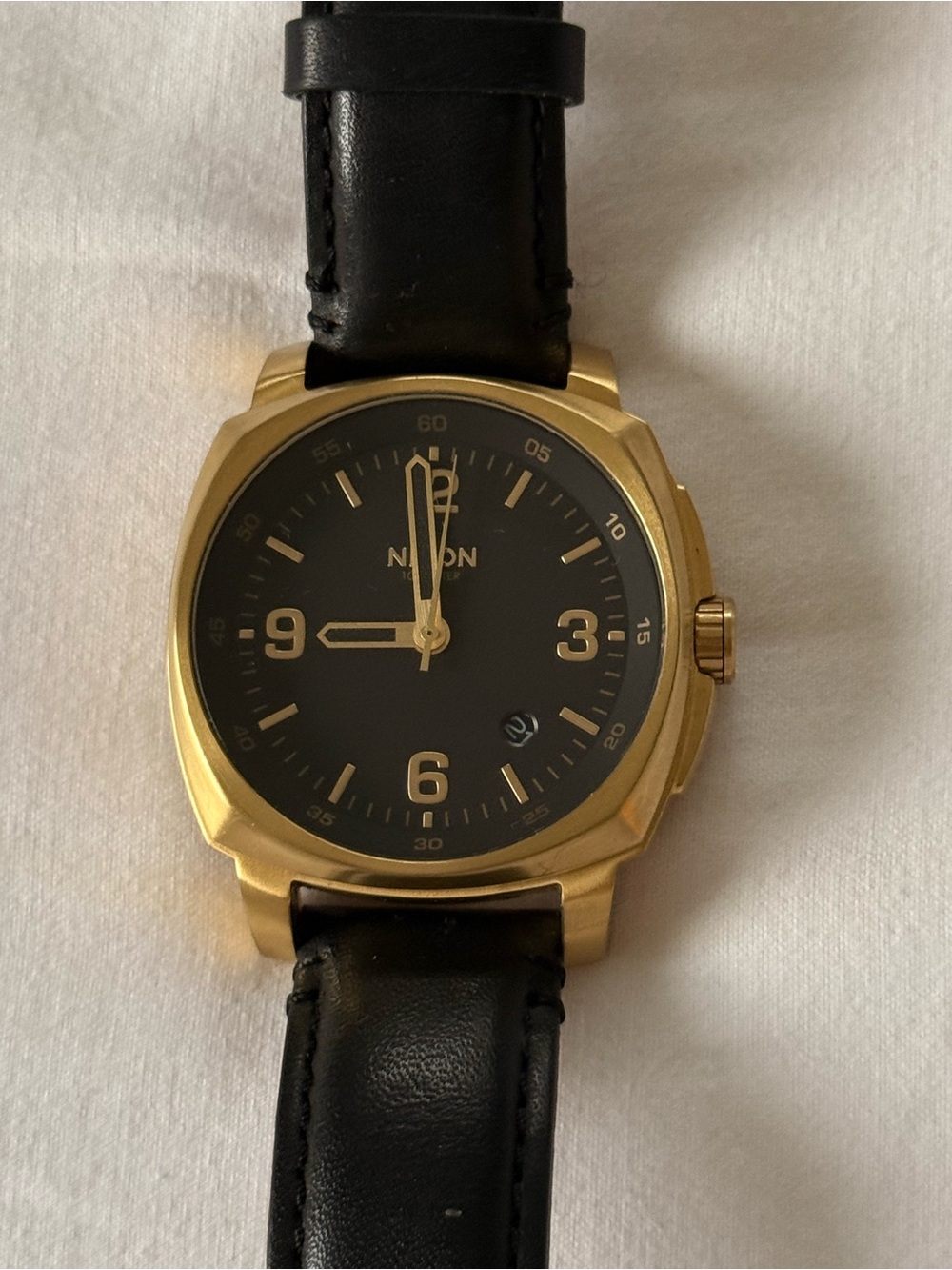Nixon Gold Case Black Dial Leather Strap Men’s Watch